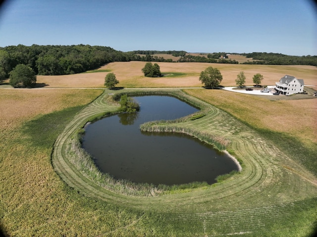 view of home's community featuring a rural view and a water view