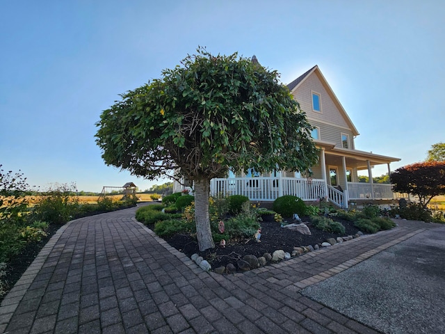 exterior space featuring covered porch