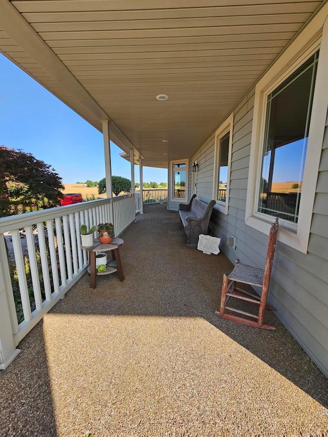 view of patio featuring a porch