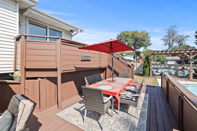 deck featuring an outdoor pool, fence, outdoor dining area, and a pergola