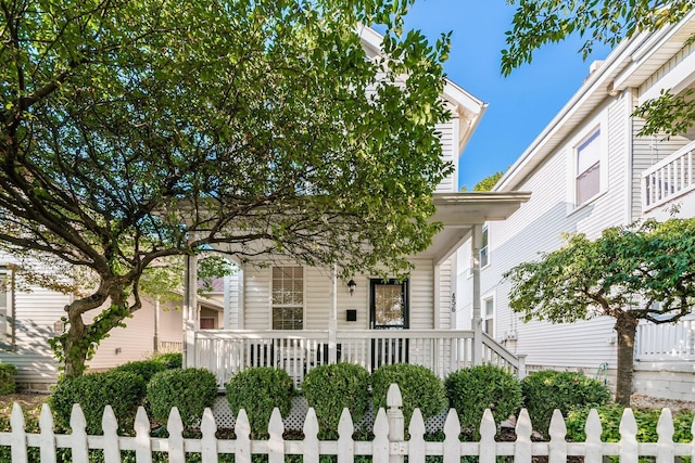 obstructed view of property featuring a porch