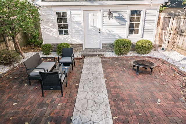 view of patio featuring a fire pit