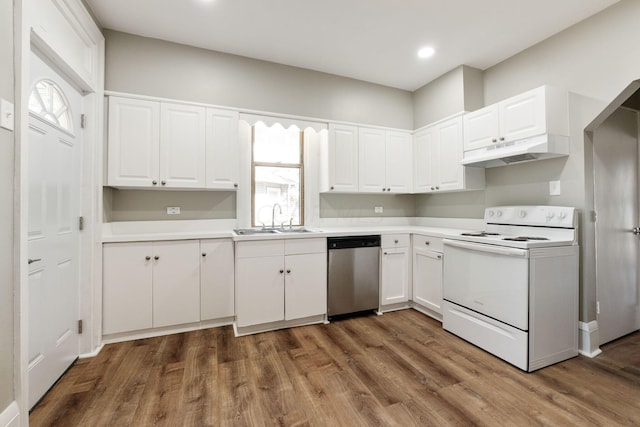 kitchen featuring white range with electric stovetop, plenty of natural light, stainless steel dishwasher, and sink