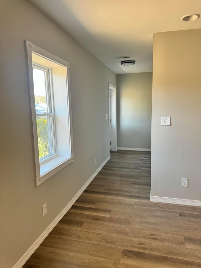 hall featuring dark wood-type flooring