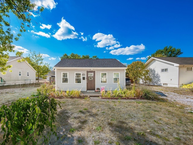 bungalow with a front yard