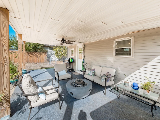 view of patio / terrace featuring a grill and an outdoor living space with a fire pit