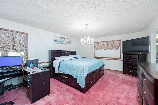 carpeted bedroom with a textured ceiling and an inviting chandelier