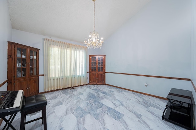 unfurnished room featuring a textured ceiling, lofted ceiling, and a notable chandelier