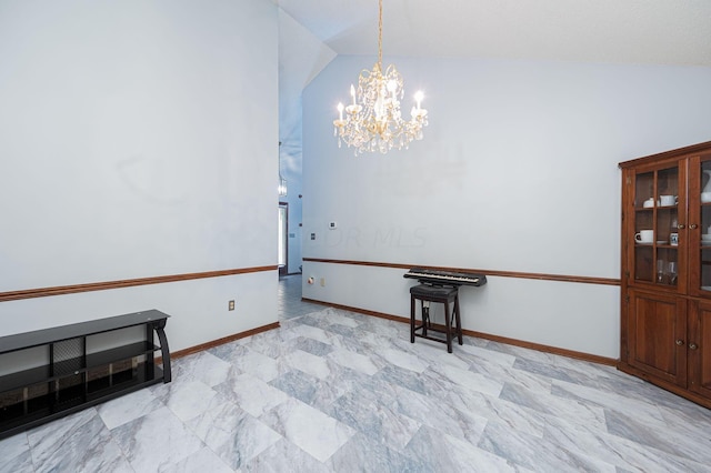 empty room featuring a chandelier and vaulted ceiling