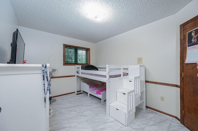 bedroom with a textured ceiling