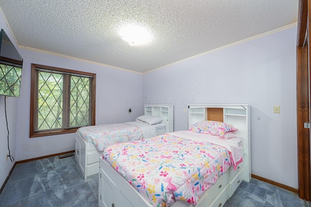 bedroom with crown molding, a textured ceiling, and dark colored carpet