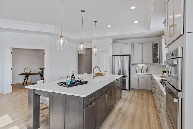 4843 Edison St, Hilliard, OH 43026 - kitchen with appliances with stainless steel finishes, light wood-type flooring, light countertops, recessed lighting, and ornamental molding