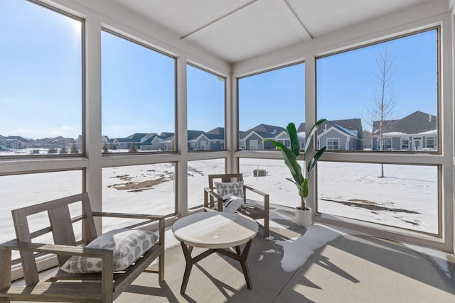 sunroom with a residential view