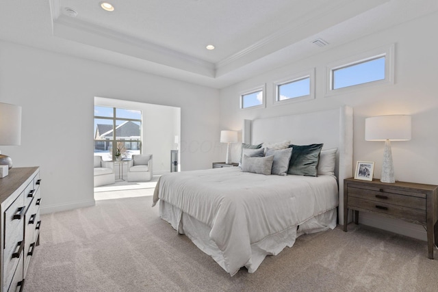 bedroom with ornamental molding, recessed lighting, a raised ceiling, and light colored carpet