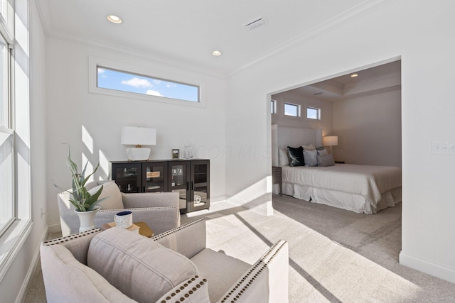 bedroom featuring carpet, multiple windows, baseboards, and crown molding