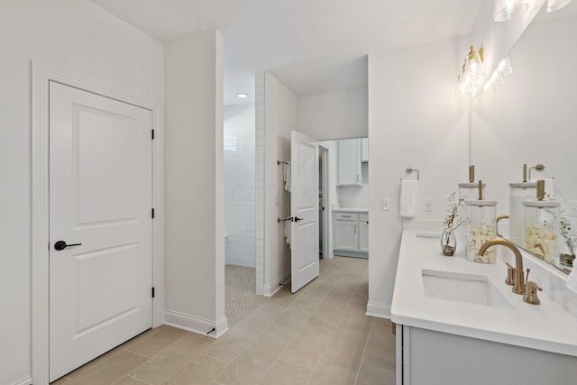 4843 Edison St, Hilliard, OH 43026 - bathroom with double vanity, a walk in shower, and tile patterned floors