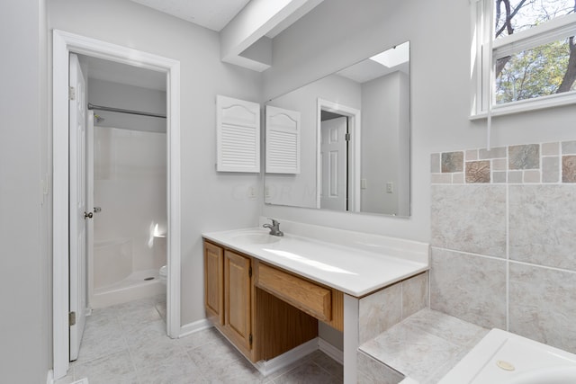 bathroom with tile patterned flooring, vanity, toilet, and walk in shower