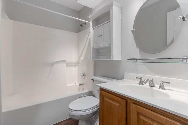 full bathroom featuring vanity, bathing tub / shower combination, toilet, and hardwood / wood-style flooring