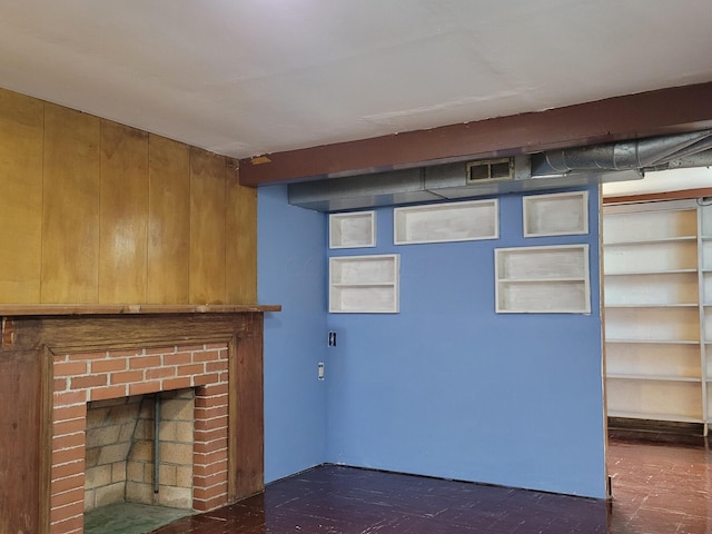 unfurnished living room with a fireplace