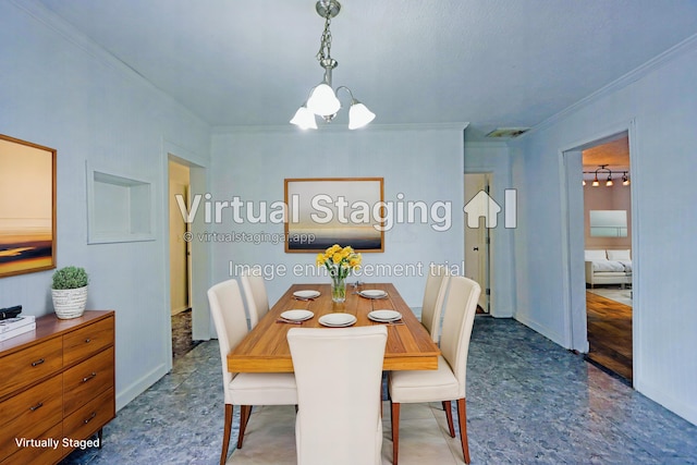 dining room with crown molding and a chandelier