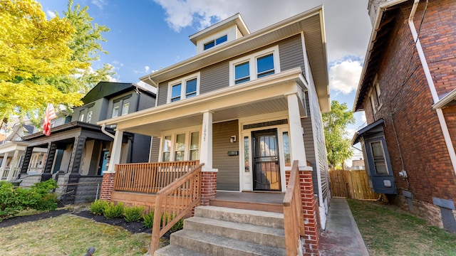 view of front of property featuring covered porch