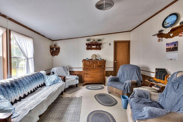 living room with a wood stove, wood walls, a textured ceiling, and ornamental molding