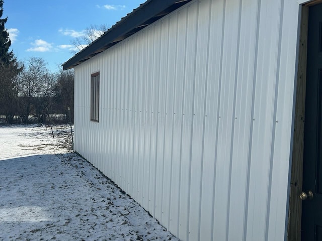 view of snow covered property