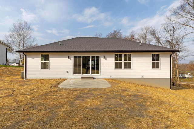 rear view of property featuring a patio area