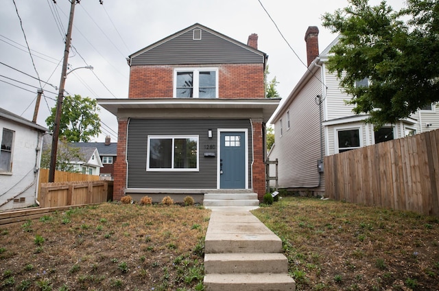 view of front facade featuring a front lawn