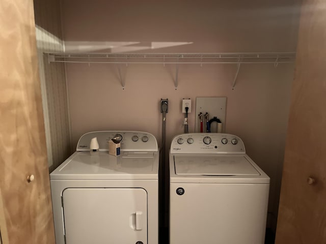 laundry room featuring washer and clothes dryer