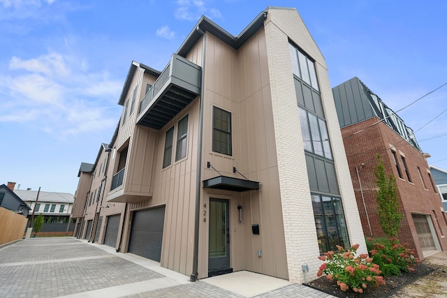 view of building exterior featuring a garage