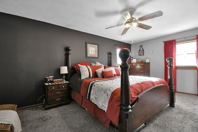 bedroom featuring dark carpet and ceiling fan