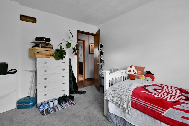 bedroom featuring carpet