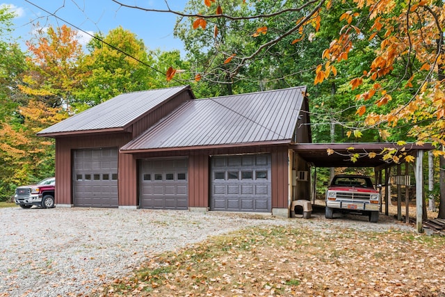 garage featuring a carport