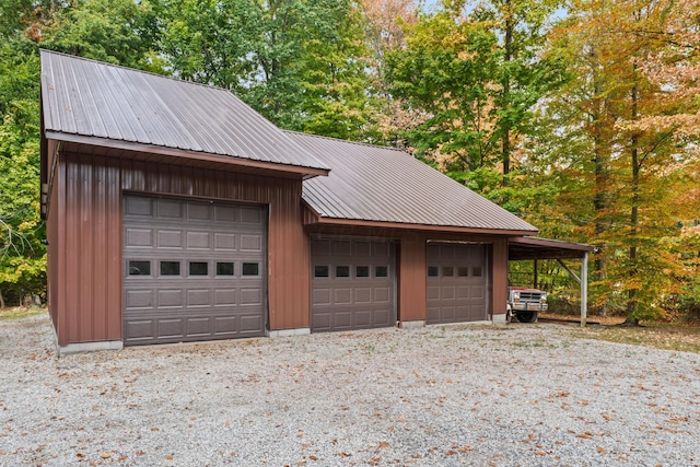 garage with a carport