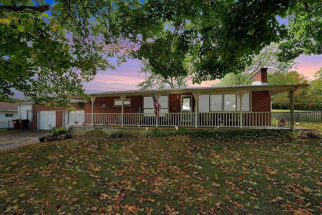 ranch-style home featuring a garage