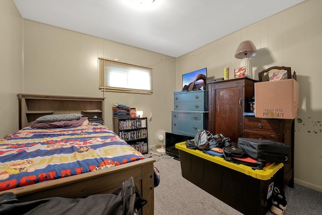 bedroom featuring light carpet