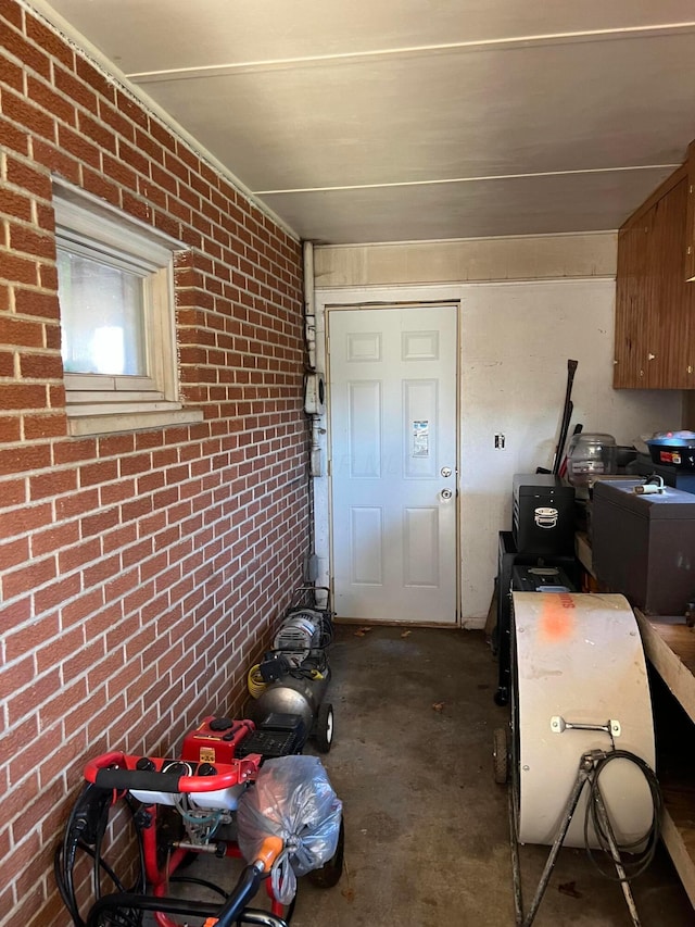 interior space with brick wall