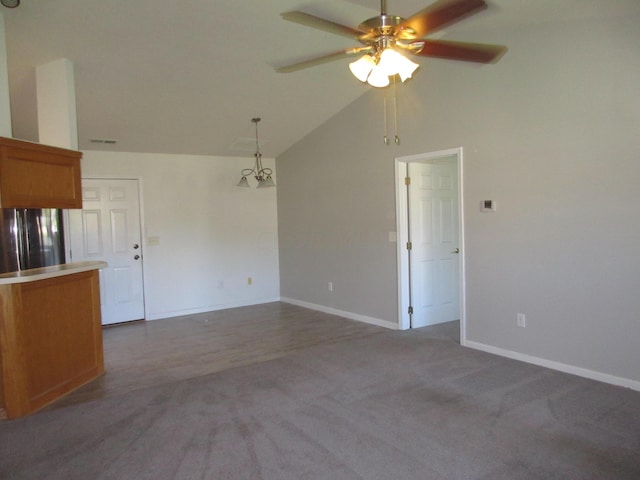 unfurnished living room featuring carpet flooring, high vaulted ceiling, and ceiling fan