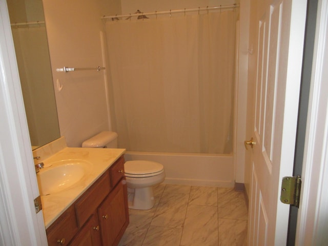 full bathroom with vanity, shower / bath combination with curtain, and toilet