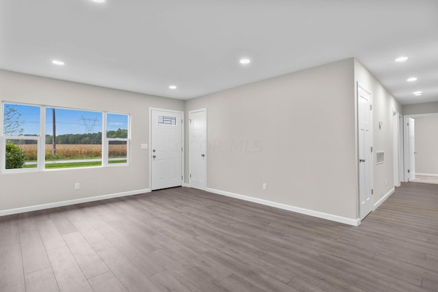 entrance foyer with hardwood / wood-style floors