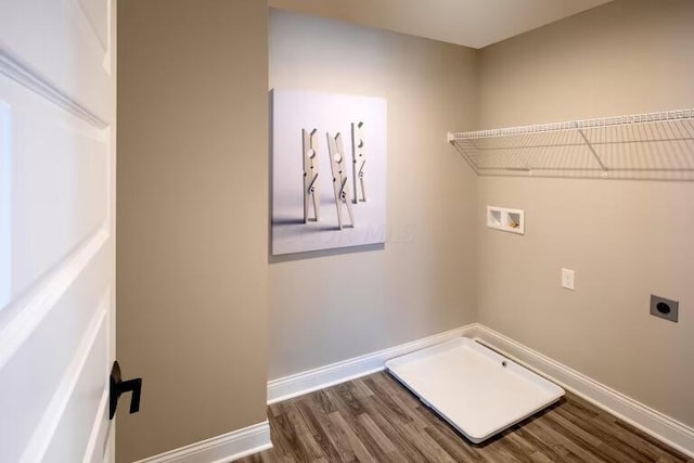 laundry room with baseboards, hookup for an electric dryer, laundry area, dark wood-style flooring, and washer hookup