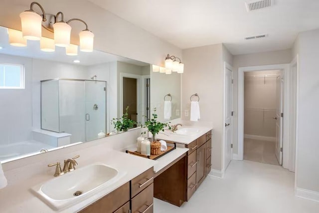 8768 Apricot Way Lot 1918, Plain City, OH 43064 - bathroom with a shower stall, double vanity, a spacious closet, and a bathtub