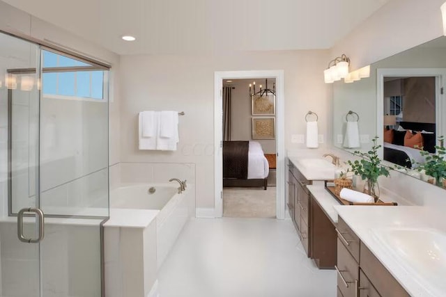8768 Apricot Way Lot 1918, Plain City, OH 43064 - bathroom featuring ensuite bath, vanity, a bath, a stall shower, and a chandelier