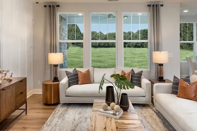 sunroom / solarium featuring visible vents and a wealth of natural light