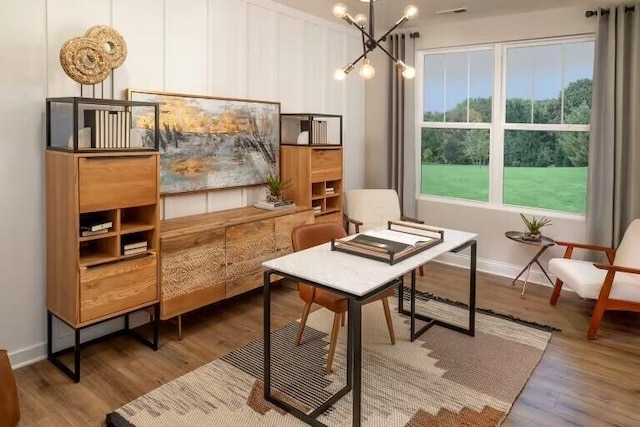 8768 Apricot Way Lot 1918, Plain City, OH 43064 - sitting room featuring wood finished floors, a chandelier, and a desk