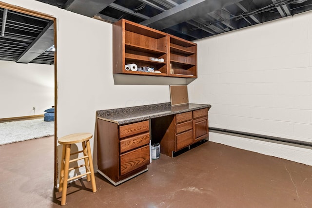 basement with built in desk