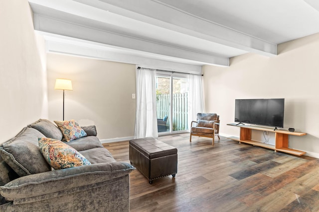 living room featuring beamed ceiling and wood-type flooring