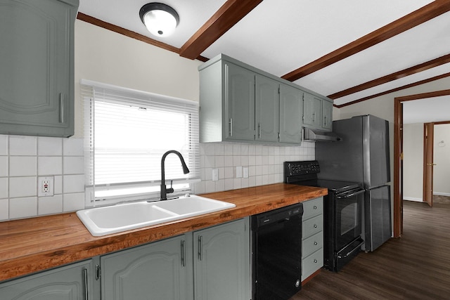 kitchen with tasteful backsplash, sink, black appliances, vaulted ceiling with beams, and dark hardwood / wood-style floors