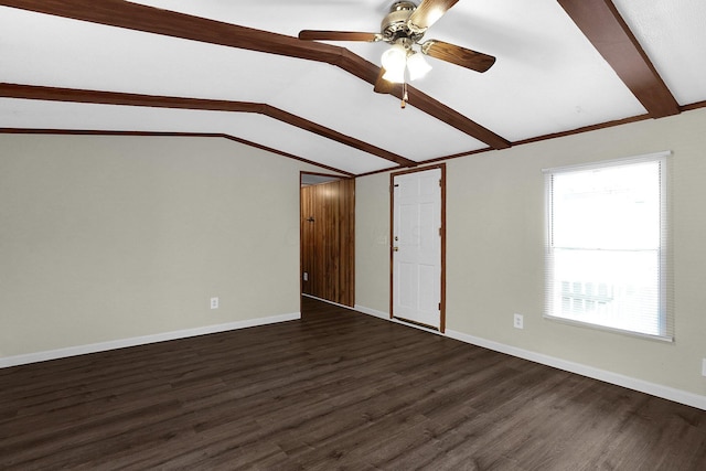 spare room with lofted ceiling with beams, dark hardwood / wood-style floors, and ceiling fan